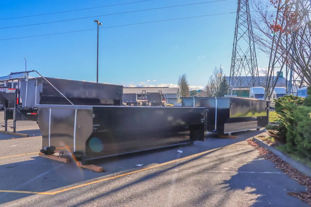 Roll-off dumpster ready for waste disposal at job site for 2 Yard Dumpster Rental in Providence Village